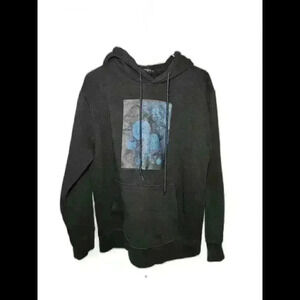 Stylish Black Hoodie with Eye-Catching Blue Floral Design